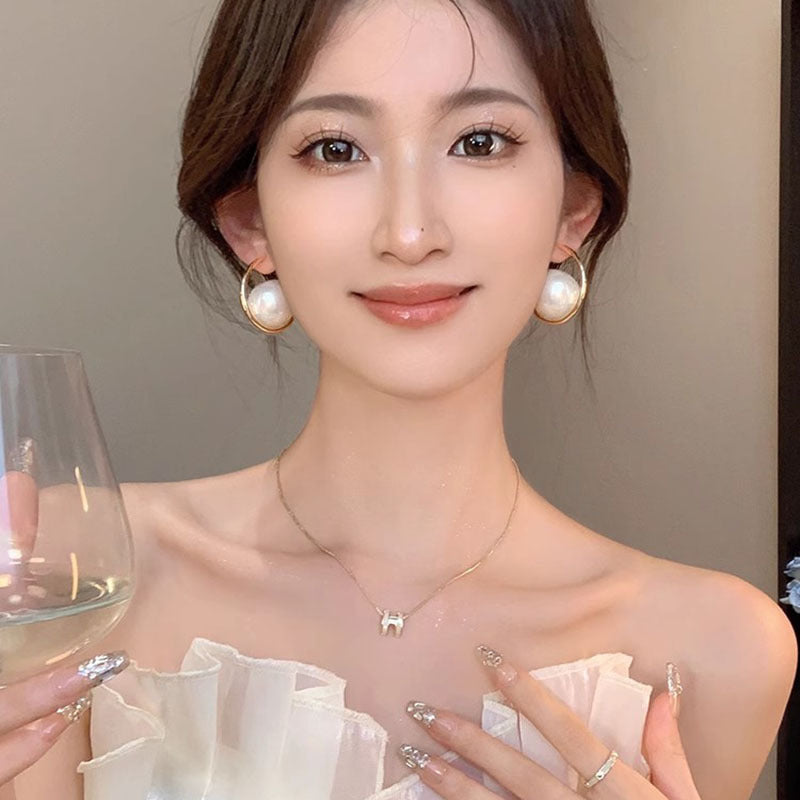 Silver Hoop Earrings with Oversized Pearl Accent